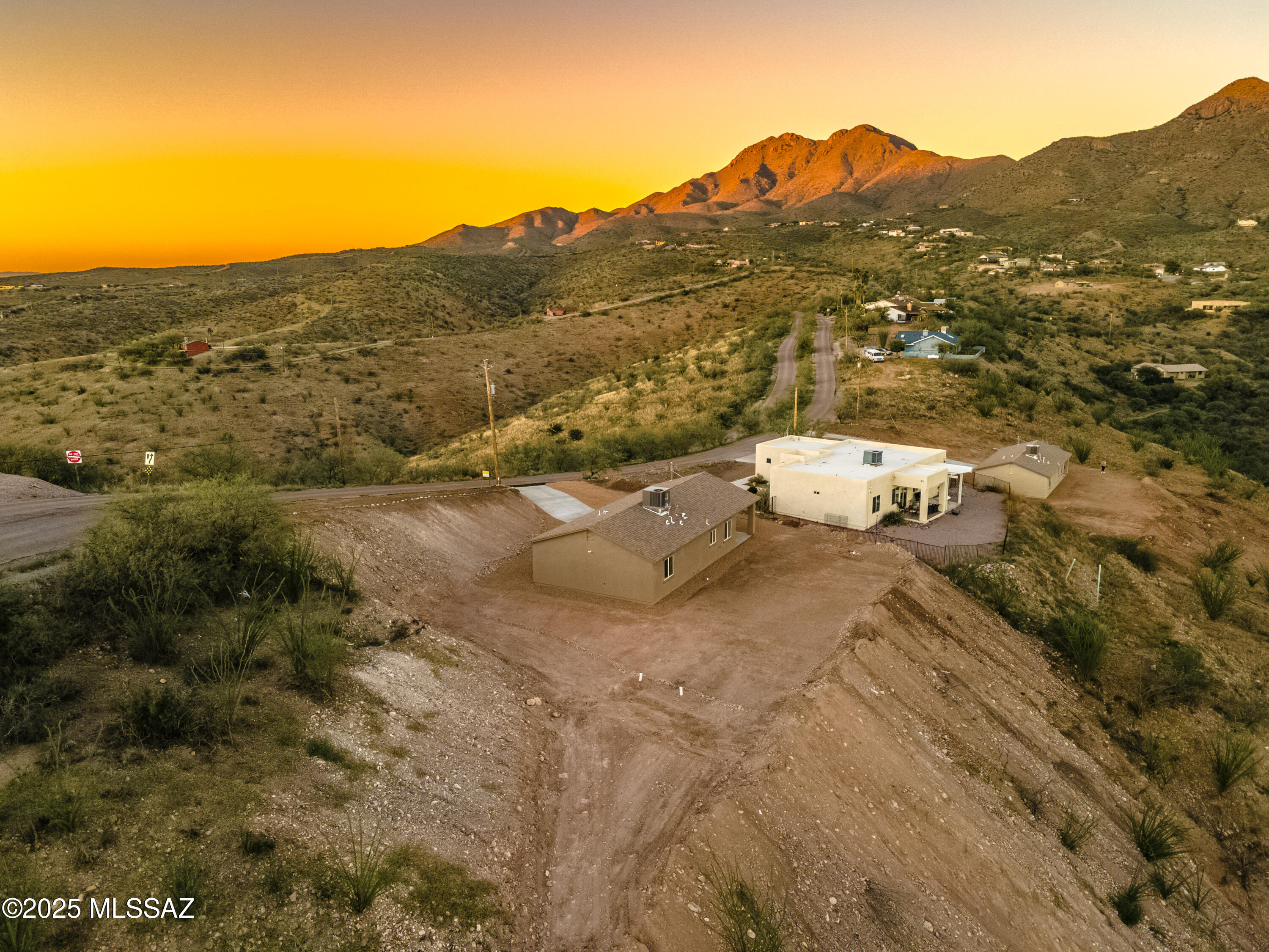 329 Camino Magnifico Rio Rico, AZ 85648 - Photo 39 of 47 a view of a town with mountains in the background