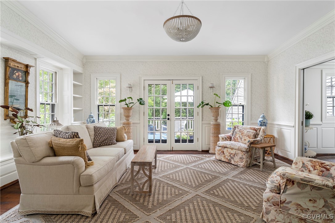 10700 Darby Circle Midlothian, VA 23113 - Photo 12 of 50 a living room with furniture a large window and a chandelier