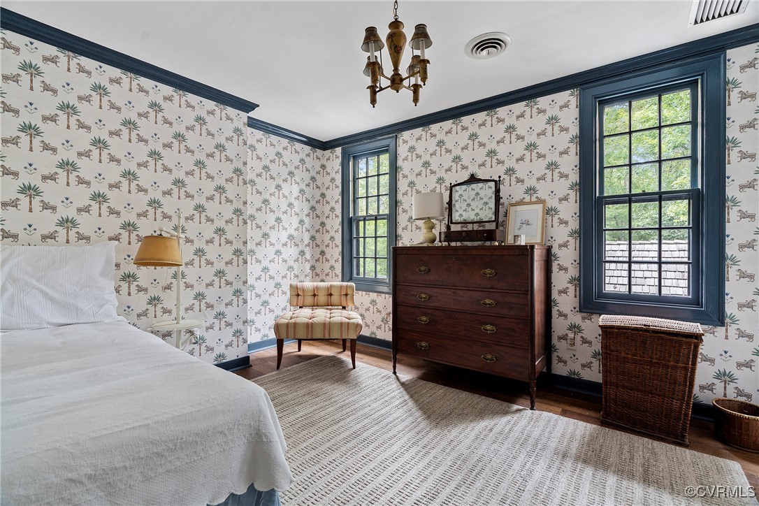 10700 Darby Circle Midlothian, VA 23113 - Photo 41 of 50 a bedroom with a bed and wooden floor