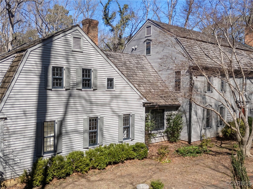 10700 Darby Circle Midlothian, VA 23113 - Photo 50 of 50 a view of a house with a yard and potted plants