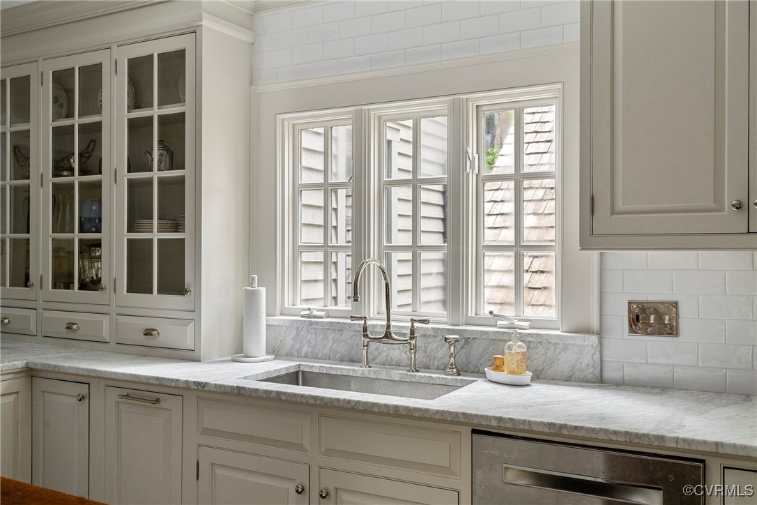 10700 Darby Circle Midlothian, VA 23113 - Photo 7 of 50 a kitchen with granite countertop a sink and a window