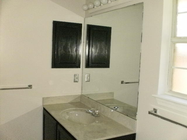 27 Beacon Way Santa Rosa Beach, FL 32459 - Photo 16 of 22 a bathroom with a sink and a mirror