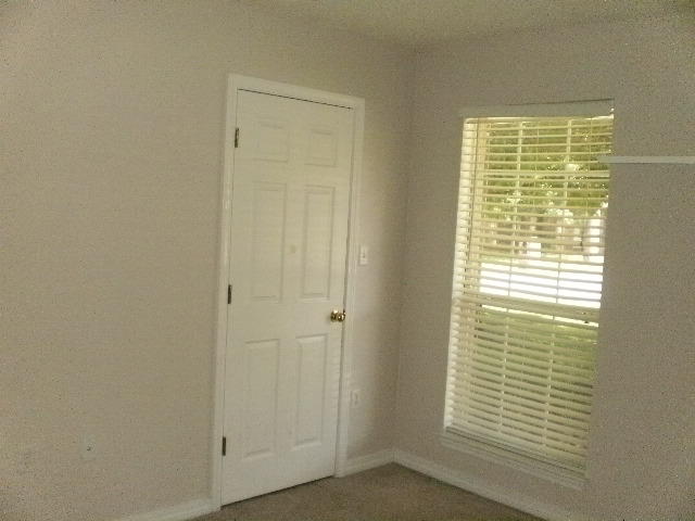 27 Beacon Way Santa Rosa Beach, FL 32459 - Photo 17 of 22 a view of an empty room with a window