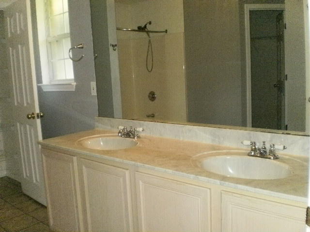 27 Beacon Way Santa Rosa Beach, FL 32459 - Photo 3 of 22 a bathroom with a sink and a mirror