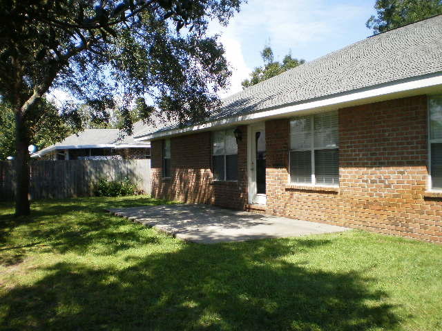 27 Beacon Way Santa Rosa Beach, FL 32459 - Photo 8 of 22 a view of a back yard of the house