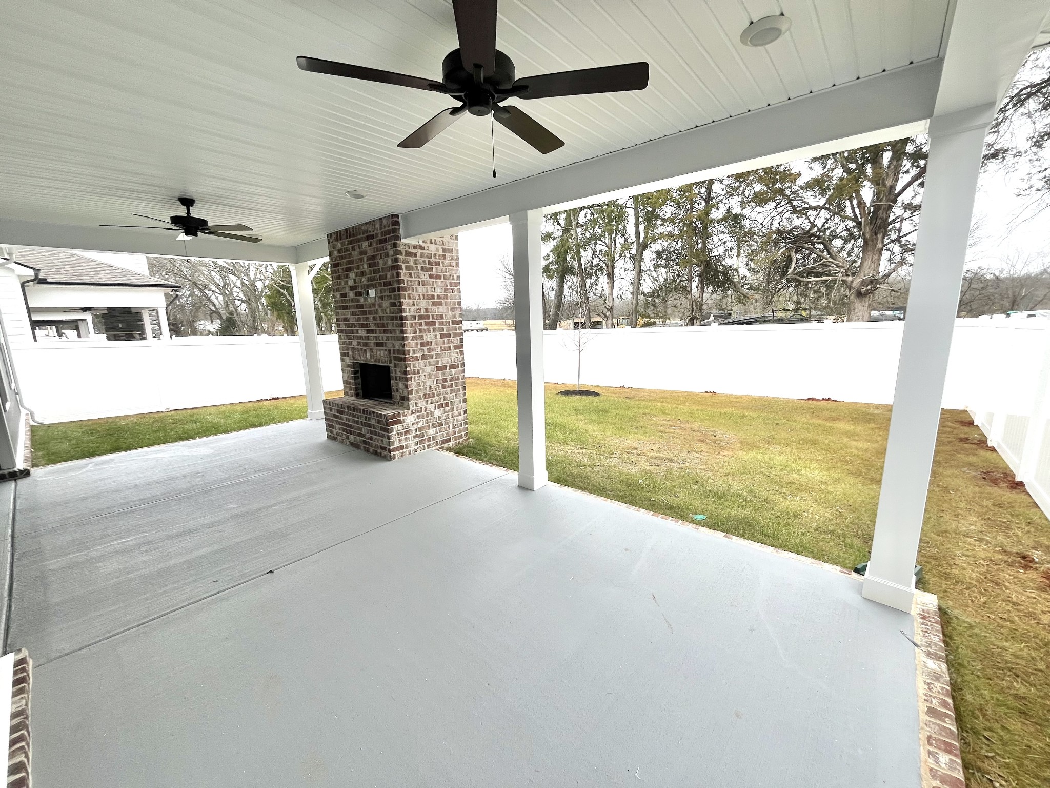 2435 Fig Drive Murfreesboro, TN 37127 - Photo 2 of 35 a view of an empty room with a fireplace and a window