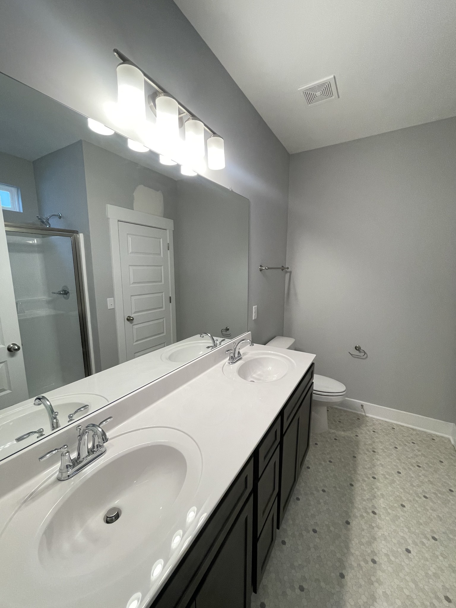 2435 Fig Drive Murfreesboro, TN 37127 - Photo 7 of 35 a bathroom with a double vanity sink and a mirror