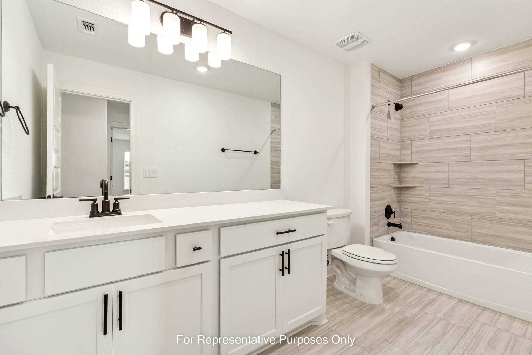 3721 Helena Way Leander, TX 78641 - Photo 12 of 15 a bathroom with a sink a toilet and shower