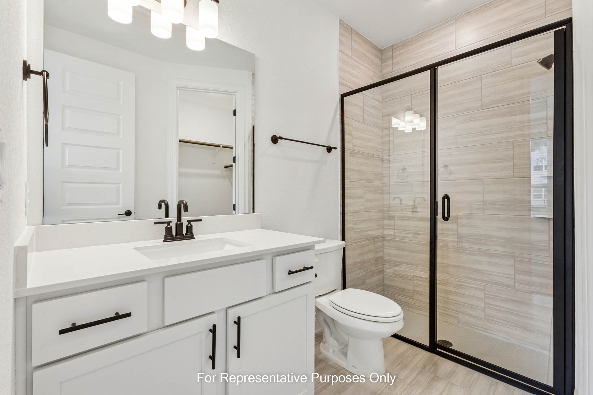 3721 Helena Way Leander, TX 78641 - Photo 4 of 15 a bathroom with a sink a toilet and shower