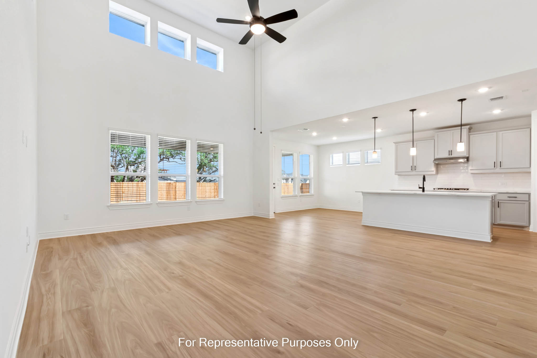 3721 Helena Way Leander, TX 78641 - Photo 8 of 15 a view of an empty room with a window and wooden floor