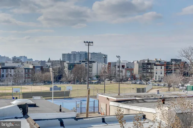 a view of a terrace with city view