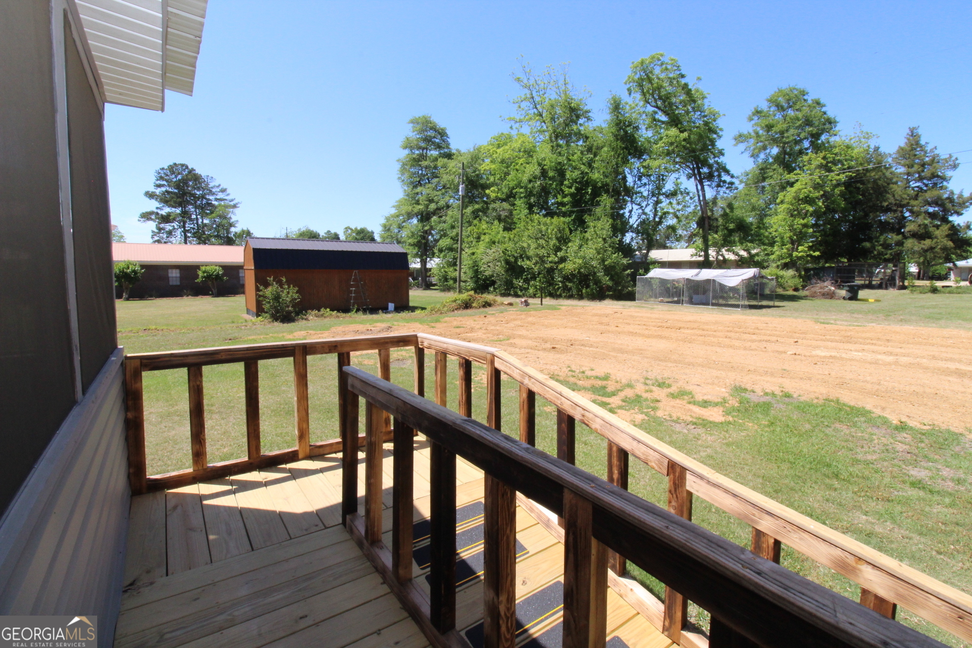 218 6th Avenue Rochelle, GA 31079 - Photo 20 of 22 a view of a balcony with an ocean view