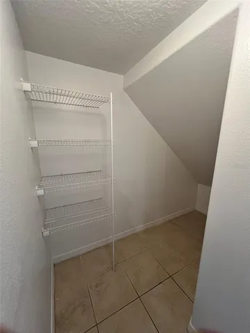 a view of a livingroom with a ceiling fan
