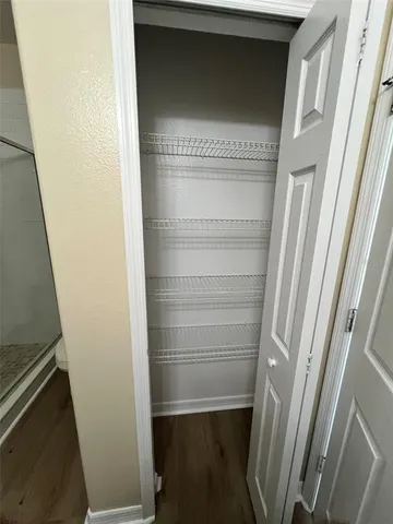 an empty room with a mirror