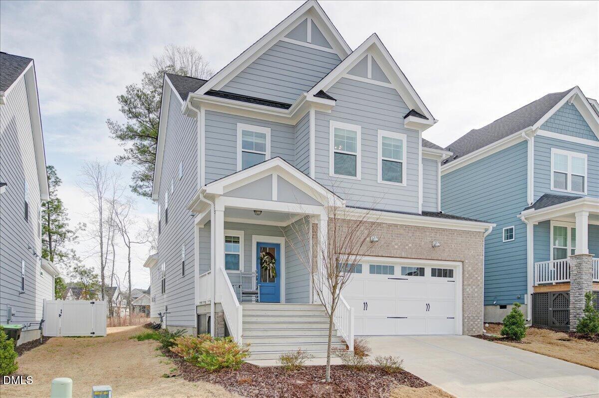 1105 Logperch Way Wendell, NC 27591 - Photo 1 of 29 a front view of a house with a yard
