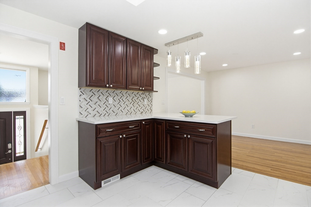 31 Spring Lane Sharon, MA 02067 - Photo 13 of 33 a kitchen with wooden cabinets