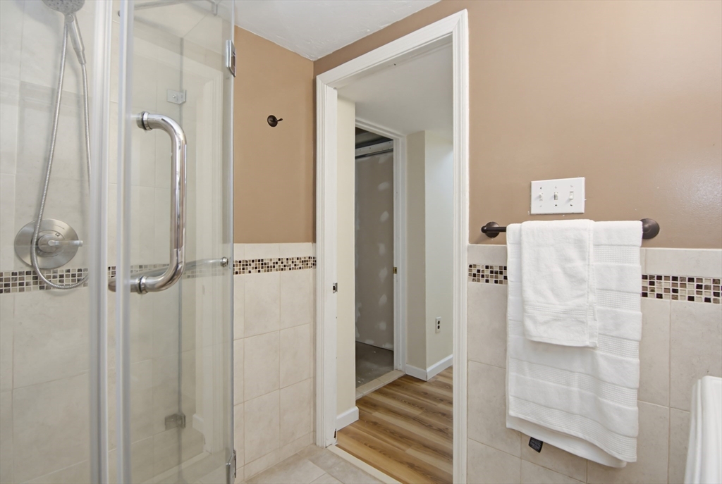 31 Spring Lane Sharon, MA 02067 - Photo 25 of 33 a bathroom with a shower