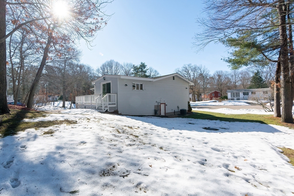 31 Spring Lane Sharon, MA 02067 - Photo 32 of 33 a view of swimming pool with a yard