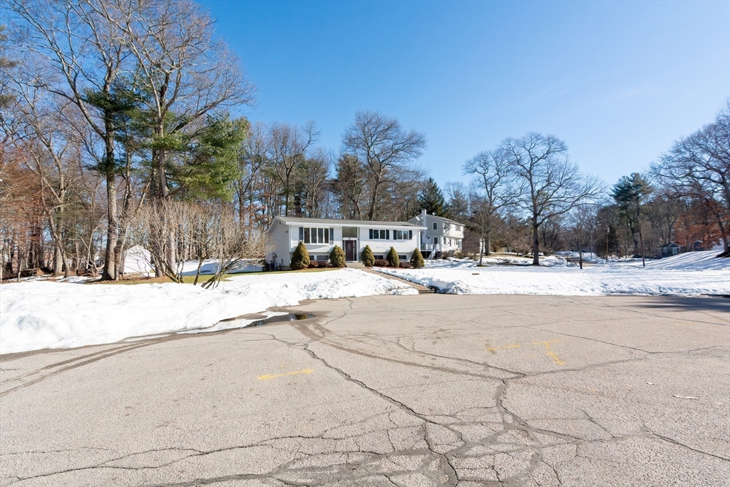 31 Spring Lane Sharon, MA 02067 - Photo 33 of 33 a view of road with a snow on the road