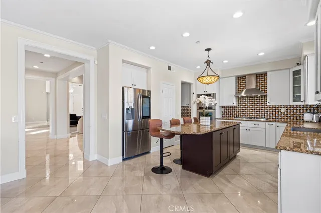 a very nice looking kitchen with a large window and stainless steel appliances