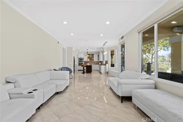 a bedroom with furniture and a flat screen tv