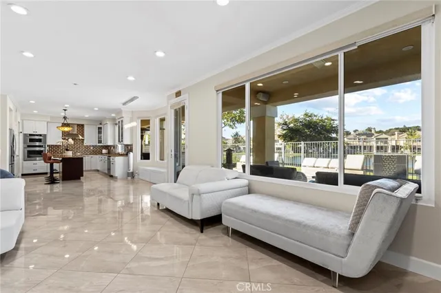 a spacious bathroom with a granite countertop sink mirror and cabinets