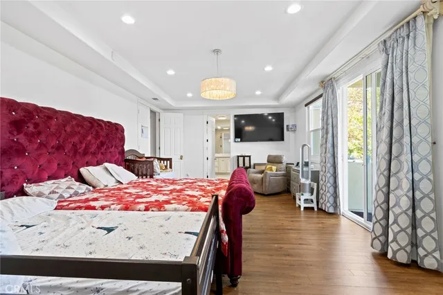 a view of a lake with houses in the back