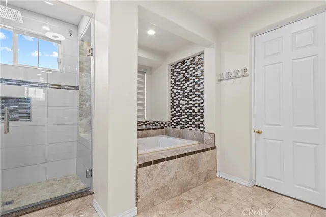 a view of a swimming pool with a patio and a yard