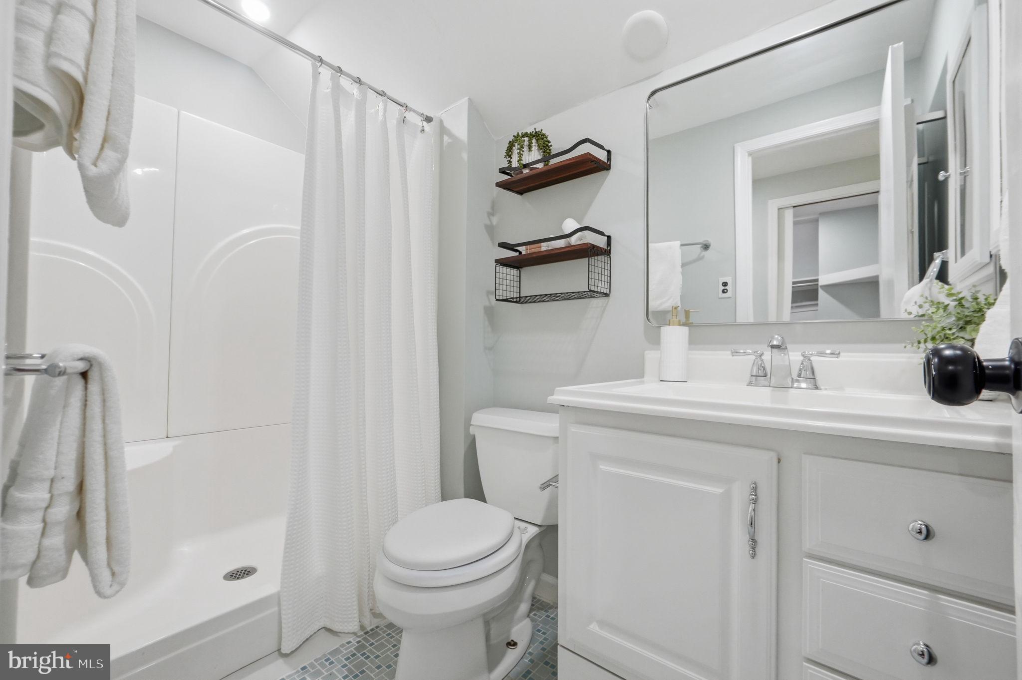 8008 Inspection House Road Potomac, MD 20854 - Photo 25 of 43 Modern bathroom with sleek finishes.