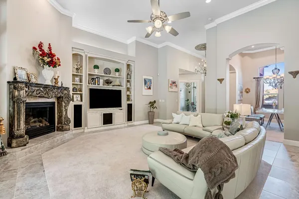 a large kitchen with kitchen island granite countertop a large center island attached withe living room