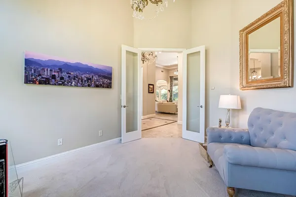 a living room with furniture fireplace and flat screen tv