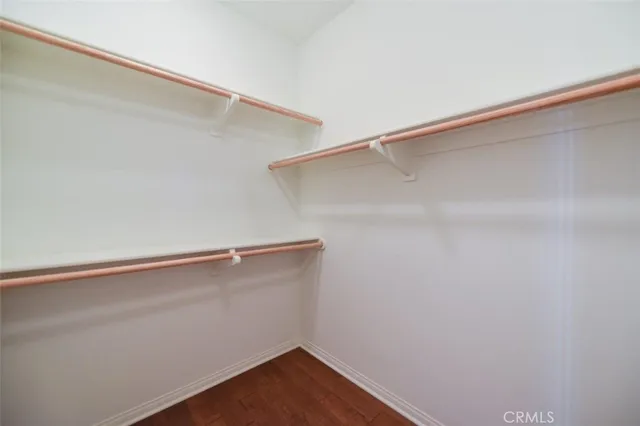a view of an empty walk in closet