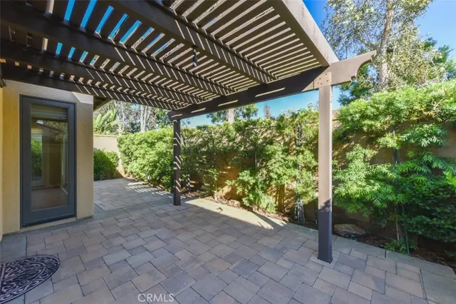 a path view of a house with a yard