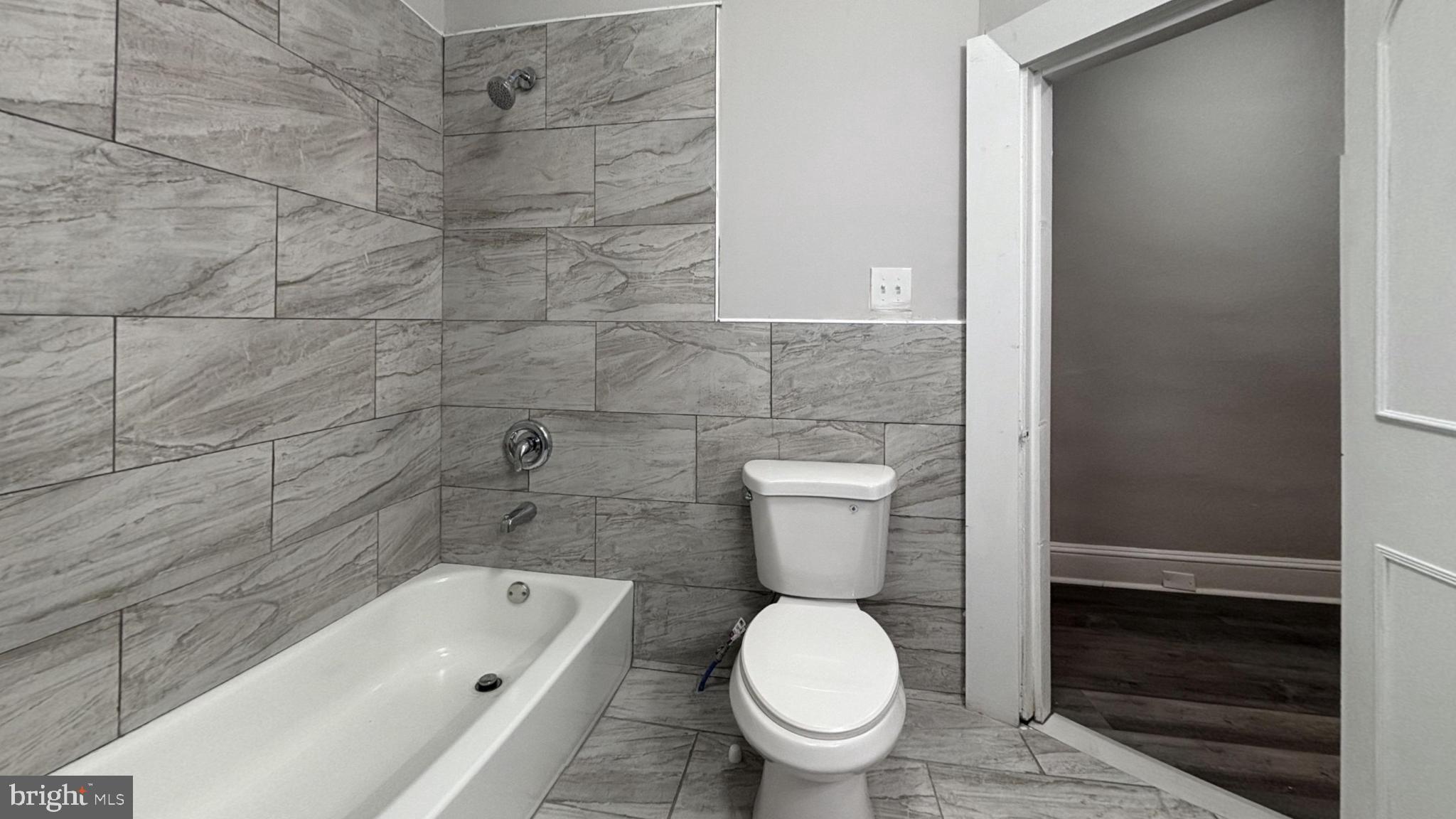 1343 North Allison Street Philadelphia, PA 19131 - Photo 3 of 5 a bathroom with a toilet and sink
