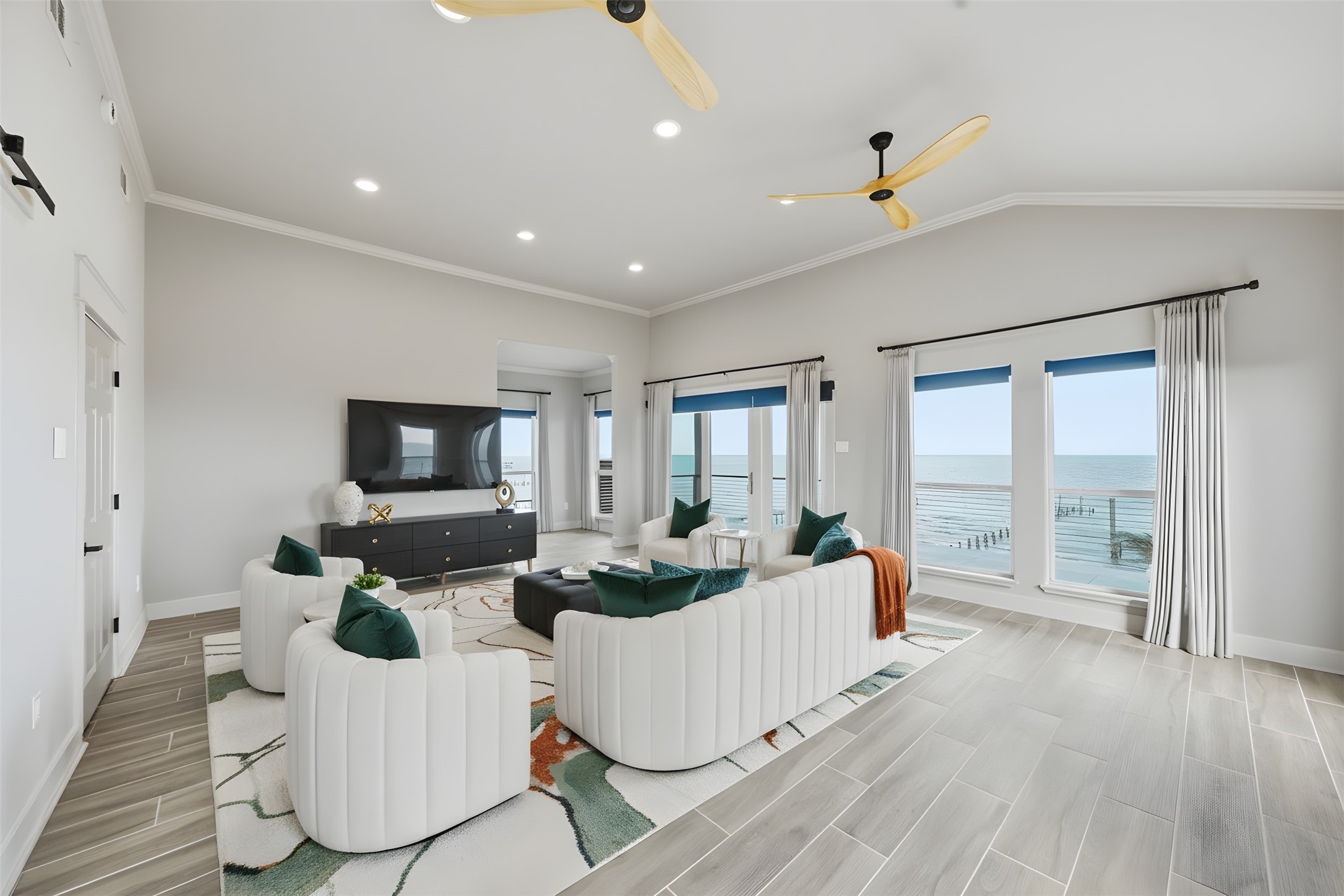 1918 Todville Road Seabrook, TX 77586 - Photo 29 of 41 Generous sitting area in the primary bedroom is perfectly positioned to relax and savor the bay views from sunrise to sunset.