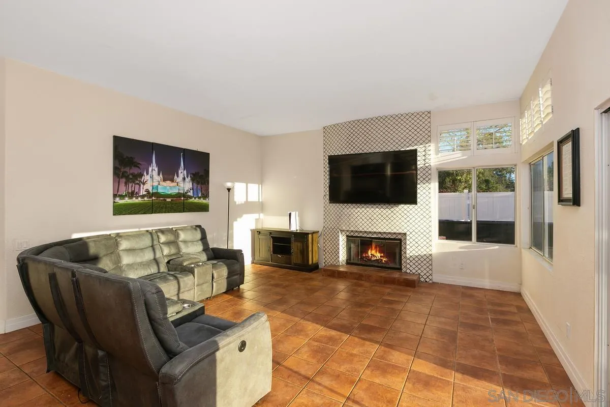 14550 Hidden Wood Road Jamul, CA 91935 - Photo 12 of 51 a living room with furniture and a flat screen tv