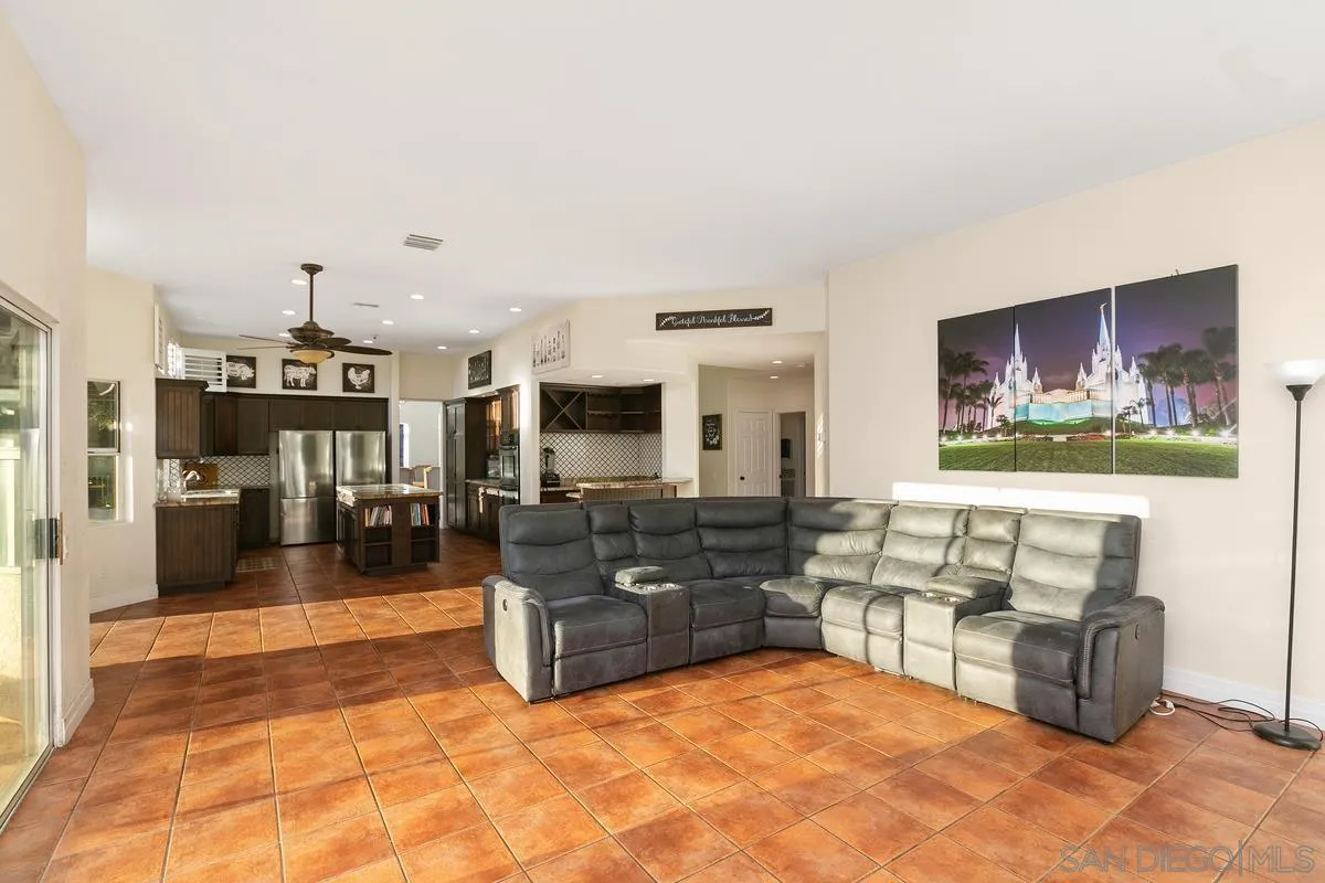 14550 Hidden Wood Road Jamul, CA 91935 - Photo 14 of 51 a living room with furniture and kitchen view