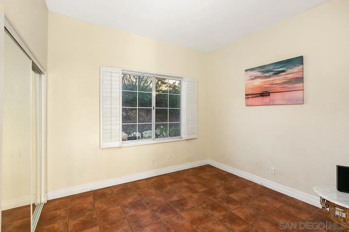 14550 Hidden Wood Road Jamul, CA 91935 - Photo 19 of 51 an empty room with a window