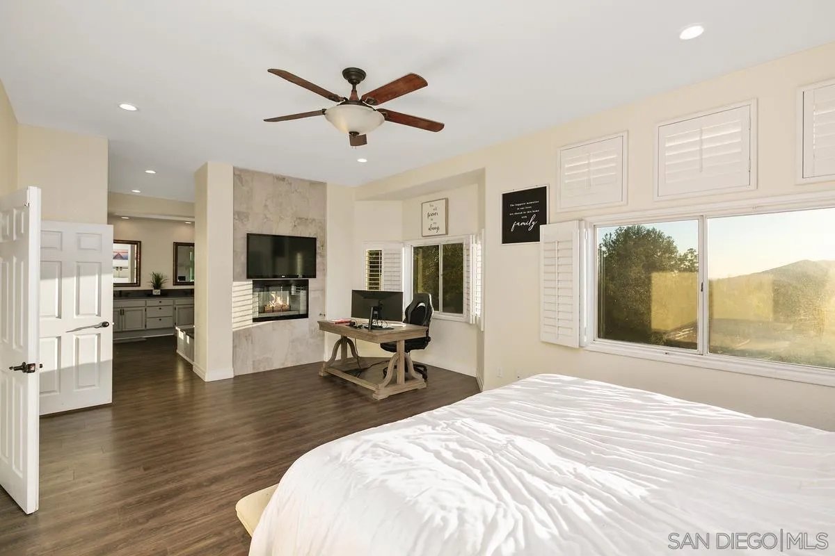 14550 Hidden Wood Road Jamul, CA 91935 - Photo 22 of 51 a bed room with a bed and furniture