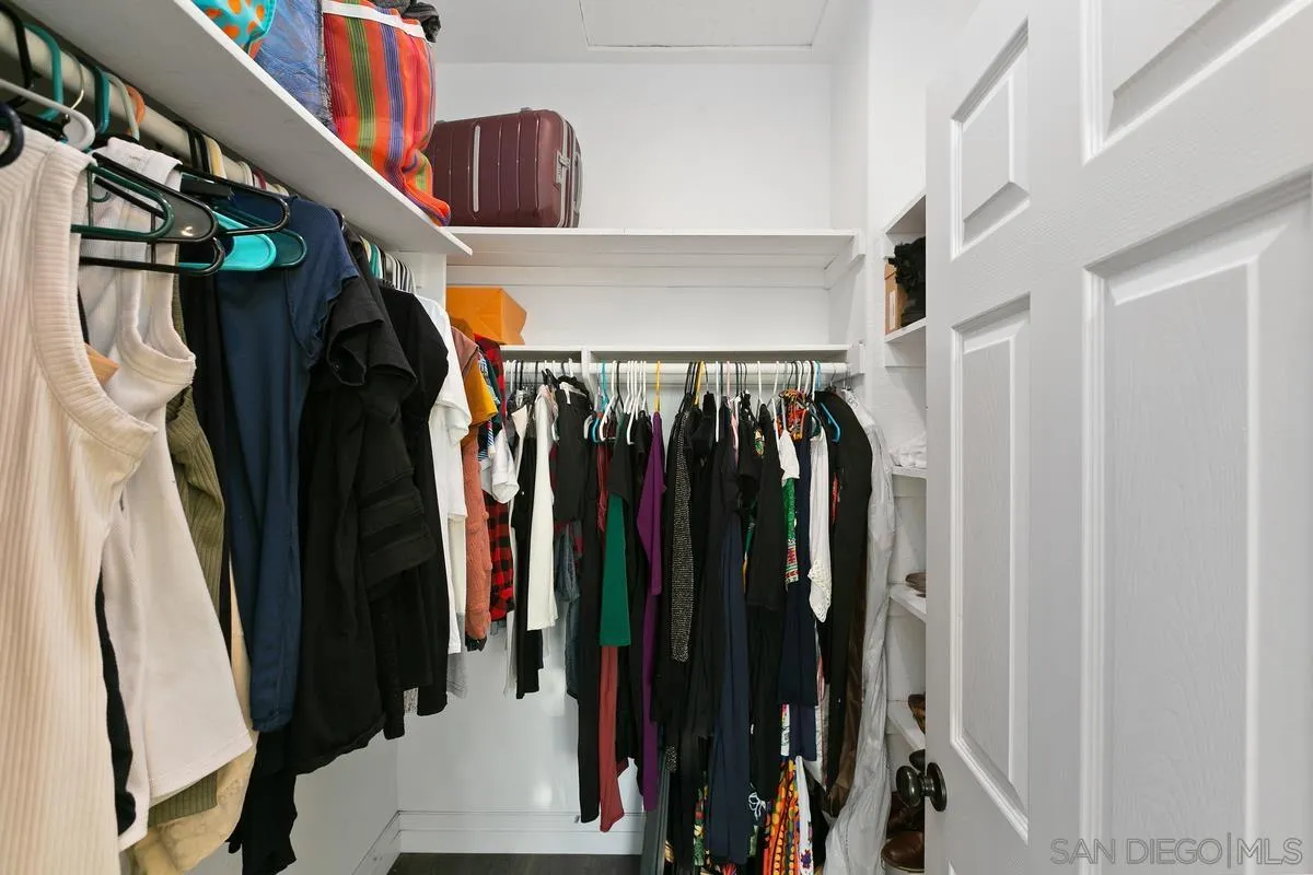 14550 Hidden Wood Road Jamul, CA 91935 - Photo 25 of 51 a view of walk in closet with clothes and shoes