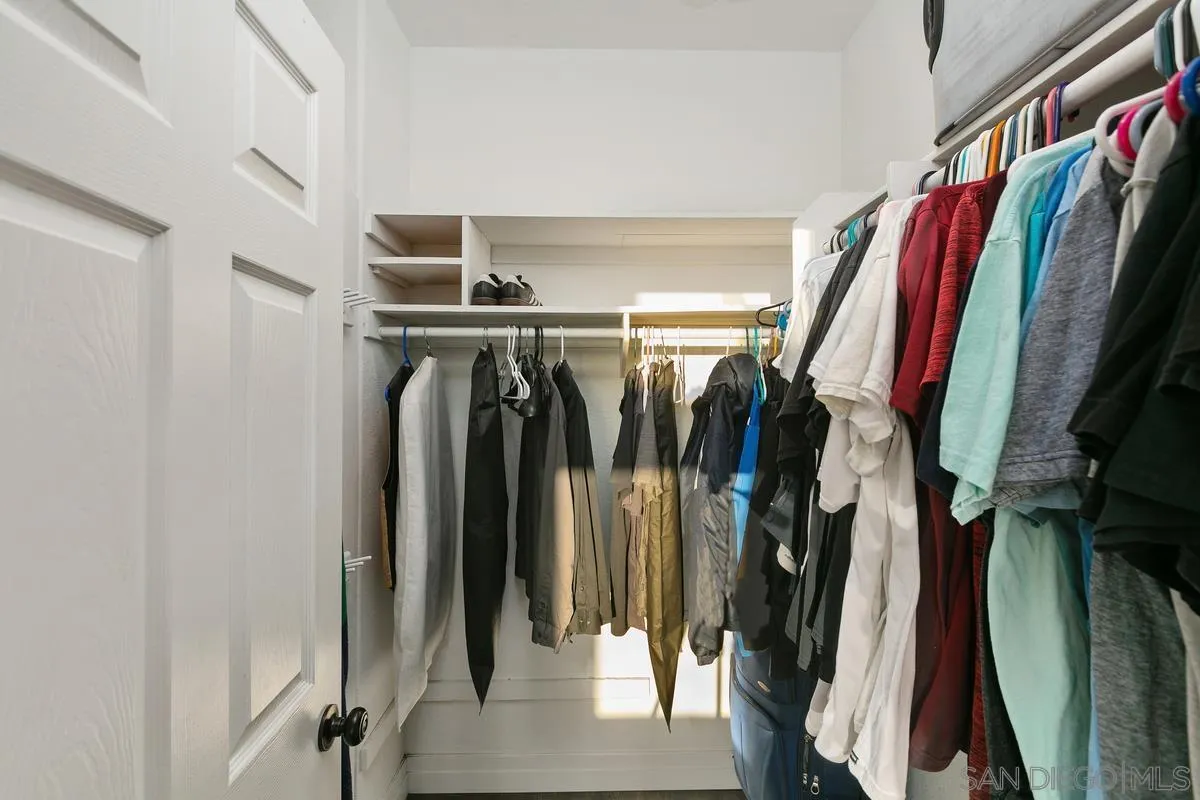 14550 Hidden Wood Road Jamul, CA 91935 - Photo 26 of 51 a view of walk in closet with clothes
