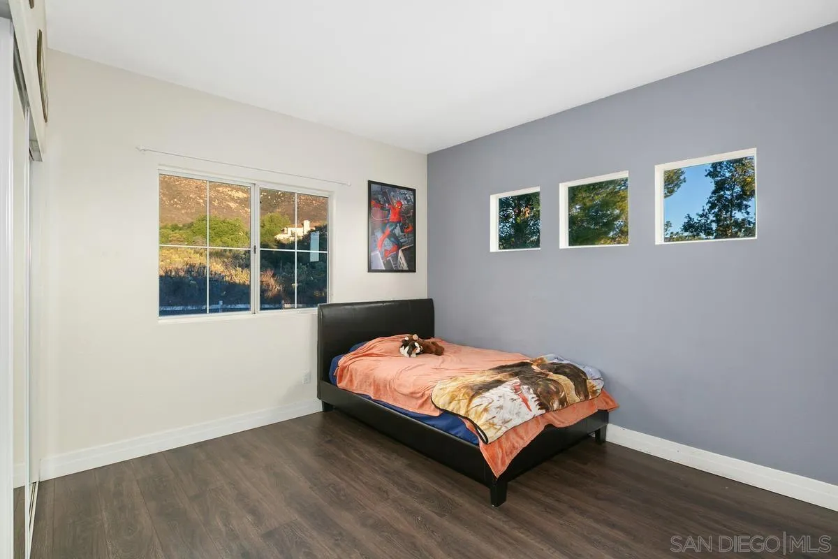 14550 Hidden Wood Road Jamul, CA 91935 - Photo 29 of 51 a room with a bed and a window