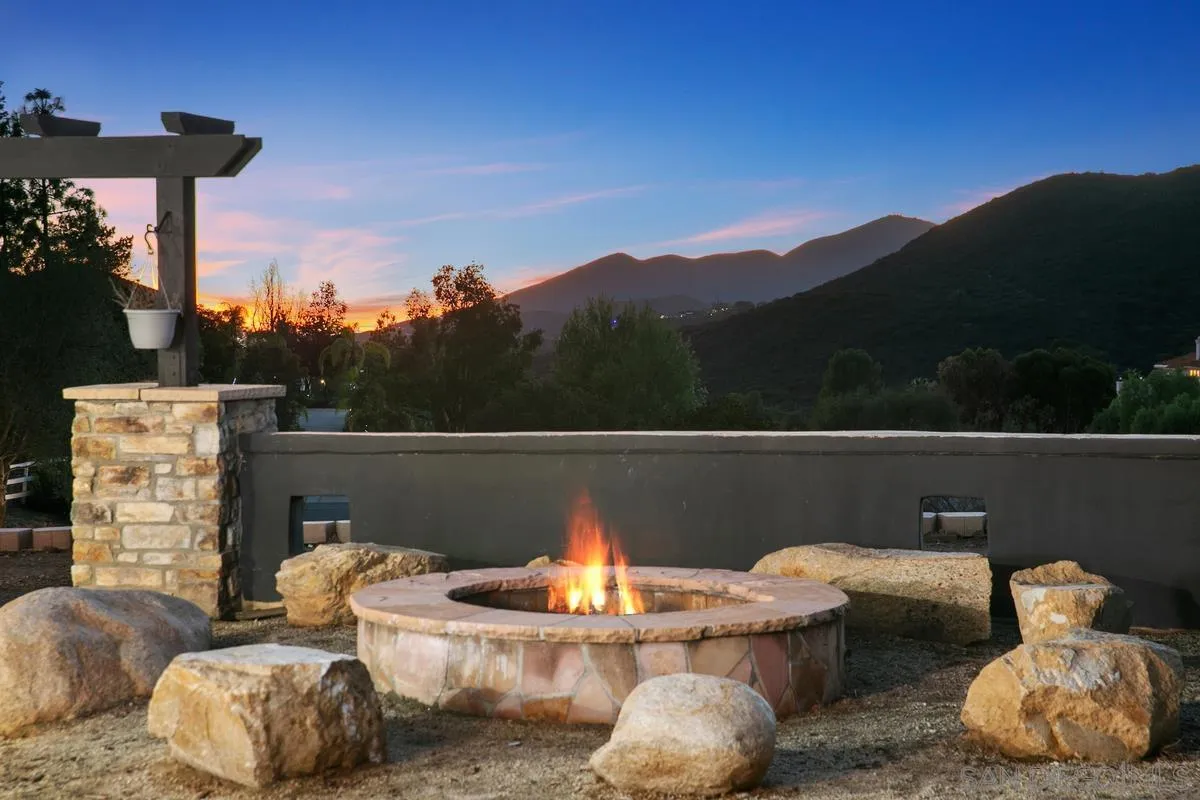 14550 Hidden Wood Road Jamul, CA 91935 - Photo 3 of 51 a terrace of a house with outdoor seating