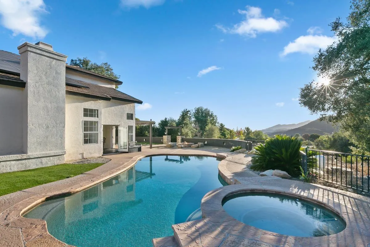 14550 Hidden Wood Road Jamul, CA 91935 - Photo 39 of 51 a view of a house with swimming pool and sitting area