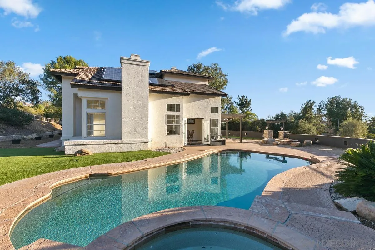 14550 Hidden Wood Road Jamul, CA 91935 - Photo 40 of 51 a view of a house with pool plants and a fire pit