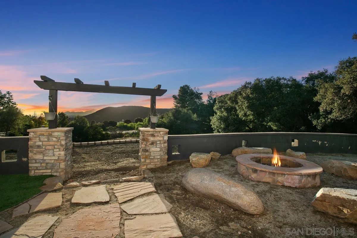 14550 Hidden Wood Road Jamul, CA 91935 - Photo 41 of 51 a view of a terrace with furniture and a garden