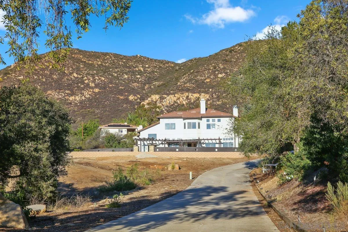 14550 Hidden Wood Road Jamul, CA 91935 - Photo 45 of 51 a view of a house with a yard