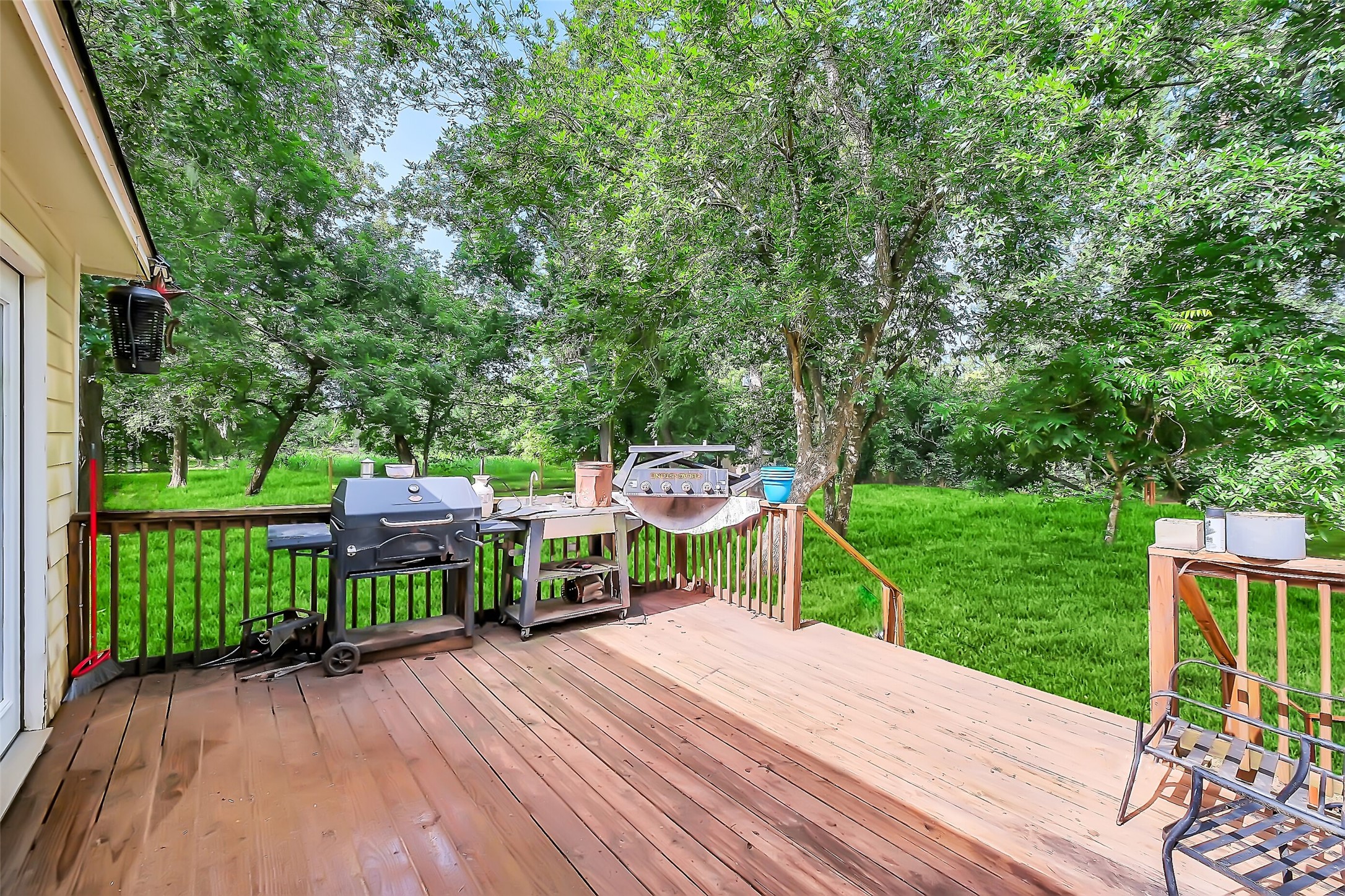 603 Hackamore Road Simonton, TX 77485 - Photo 16 of 21 a view of a table and chairs under an umbrella