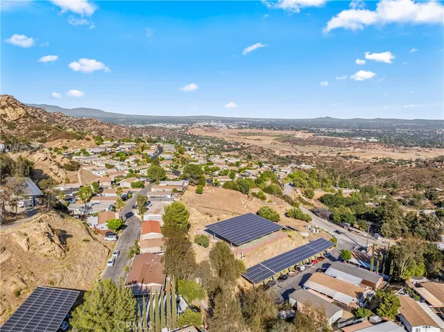 an aerial view of residential building with parking space
