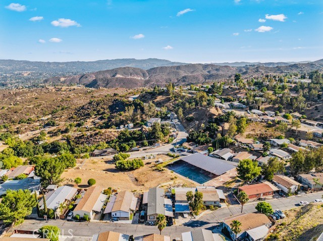 24425 Woolsey Canyon Road, Unit 196 West Hills, CA 91304 - Photo 15 of 29 an aerial view of residential houses with outdoor space